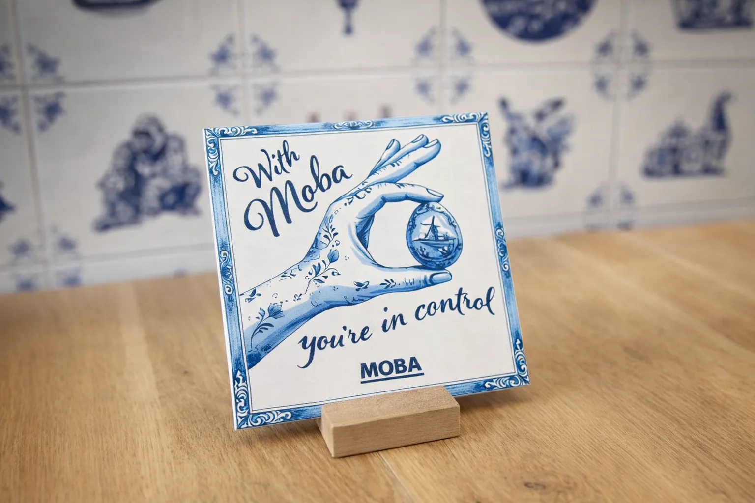 Delfts blauwe tegeltjes voor Moba als relatiegeschenk